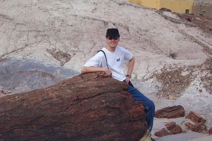 Kevin with petrified log